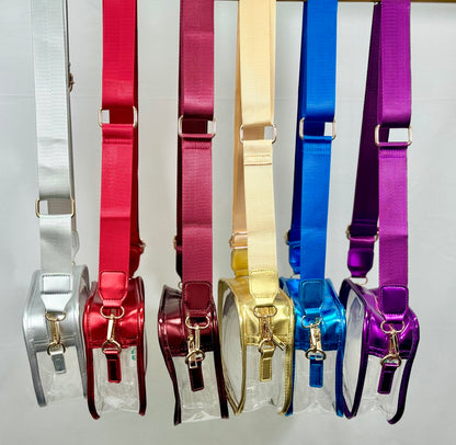 Set of colorful metallic stadium purses in various colors on a white background